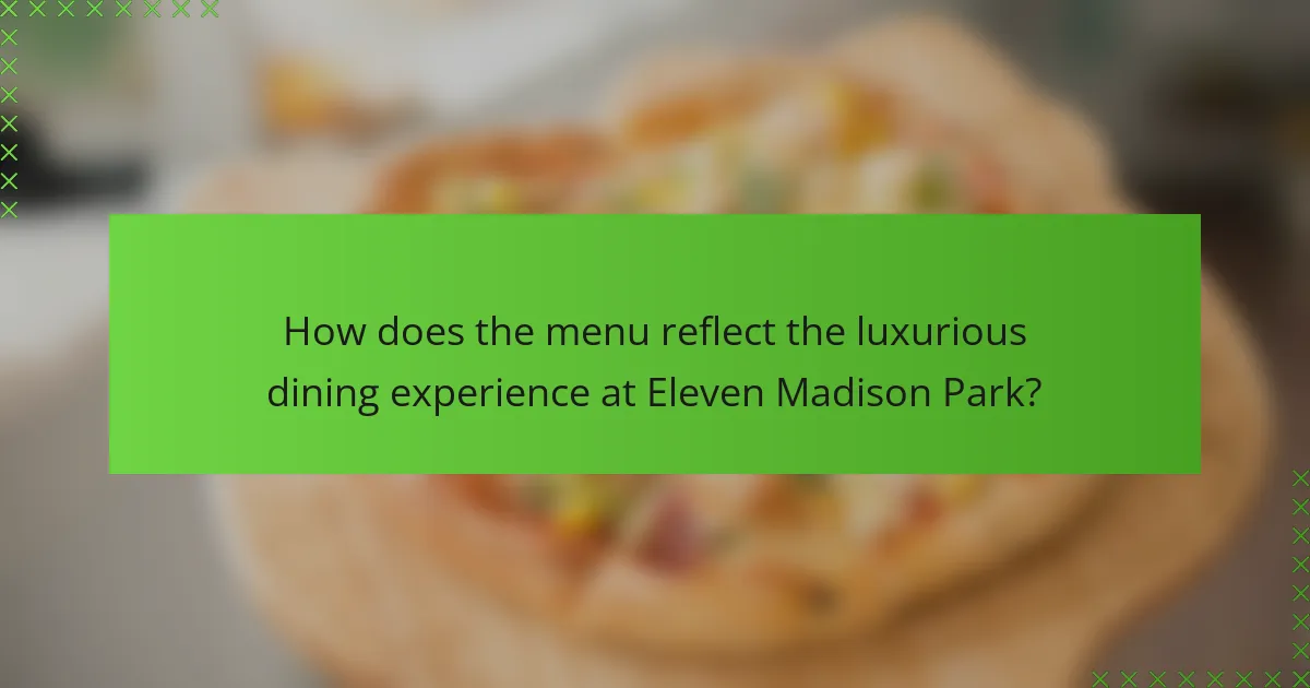 How does the menu reflect the luxurious dining experience at Eleven Madison Park?